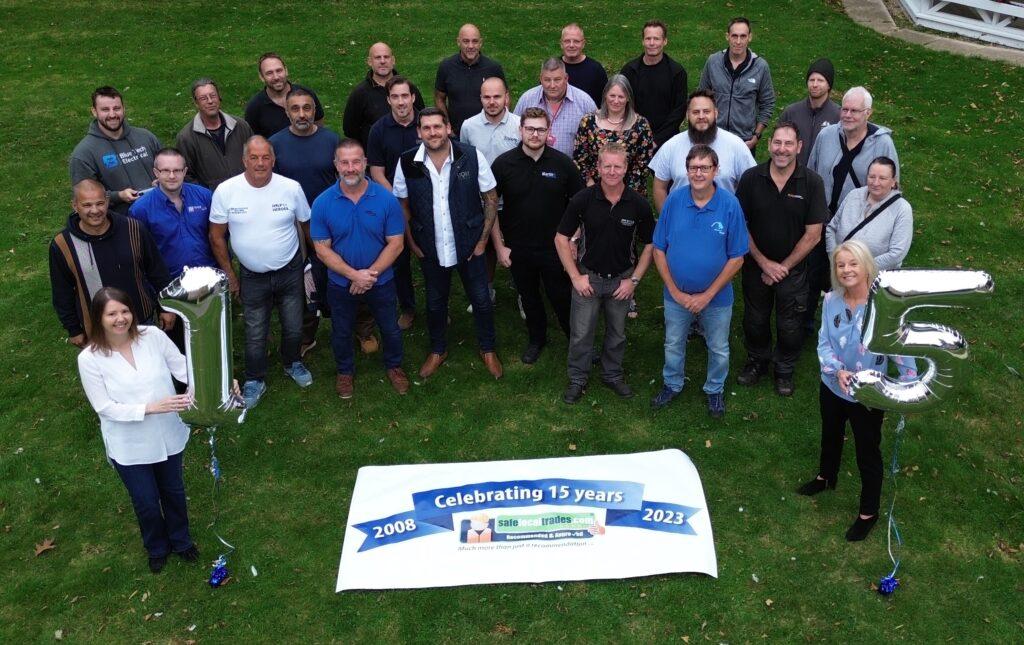 A group of Safe Local Trades members gathered for their 15th Anniversary