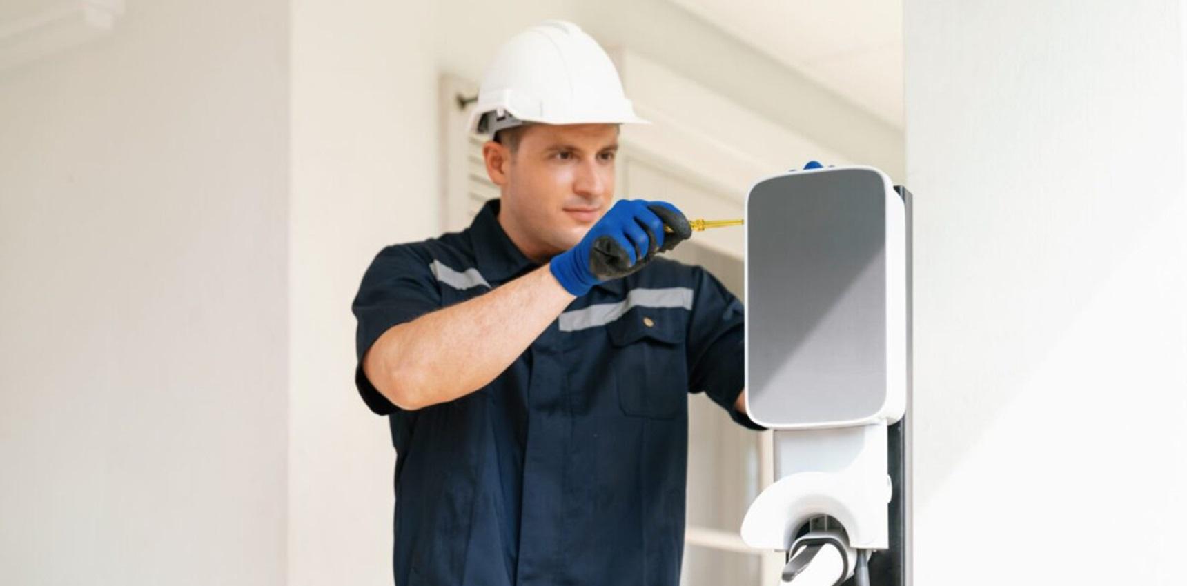 technician installing a home EV charge point